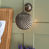 Scallop Wall Light in Antiqued Brass