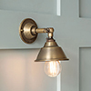 Salthouse Wall Light in Antiqued Brass