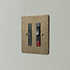 Fused Switch + Neon Antiqued Brass Hammered Plate, Black Insert