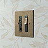 Fused Switch,Cable Outlet, Bevelled, Brass Insert Antiqued Brass