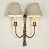 Ribbon Wall Light in Antiqued Brass