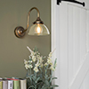 Allegra Wall Light in Antiqued Brass