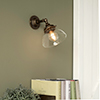 Allegra Adjustable Wall Light in Antiqued Brass