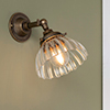 Allegra Adjustable Fluted Wall Light in Antiqued Brass