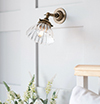 Allegra Adjustable Fluted Wall Light in Antiqued Brass