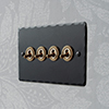 4 Gang Brass Dolly Switch Matt Black Hammered Plate