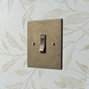 1 Gang Brass Grid Switch Antiqued Brass Bevelled Plate