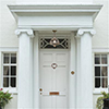 Ava Porch Light in Antiqued Brass