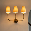 Mayfield 3 Arm Wall Light in Antiqued Brass