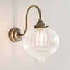Mia Wall Light in Antiqued Brass
