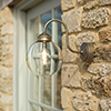 Compton Bathroom/Outdoor Light in Antiqued Brass