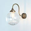 Putney Wall Light in Antiqued Brass