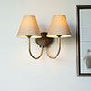 Double Saunton Bathroom Light in Antiqued Brass