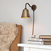 Club Plug-In Wall Light in Antiqued Brass