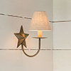 Single Star Wall Light in Antiqued Brass