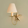 Single Star Wall Light in Antiqued Brass