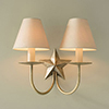 Double Star Wall Light in Antiqued Brass