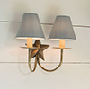 Double Star Wall Light in Antiqued Brass