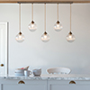 Putney Five Pendant Track in Antiqued Brass 