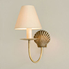 Single Shell Wall Light in Antiqued Brass