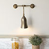 Single Howard Light in Antiqued Brass