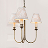 Carlisle Three Arm Pendant Light in Antiqued Brass