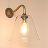 Ashley Wall Light with Carrick Arm in Antiqued Brass