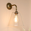 Ashley Wall Light with Brooke Arm in Antiqued Brass