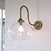 Bella Wall Light in Antiqued Brass