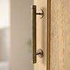 Large Stowe Door Pull in Antiqued Brass