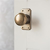 Holkham Door Knob, Ilkley Short Plate, Antiqued Brass