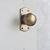 Holkham Door Knob, Nowton Short Plate, Antiqued. Brass