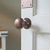 Holkham Door Knob, Rowley Plate, Heritage Copper