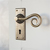 Curled Handle, Bristol Keyhole Plate, Antiqued Brass