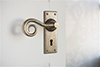 Curled Handle, Bristol Keyhole Plate, Antiqued Brass