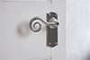 Curled Handle, Nowton Plain Plate, Nickel