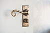 Scrolled Handle, Bristol Privacy Plate, Antiqued Brass