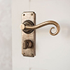 Scrolled Handle, Ilkley Privacy Plate, Antiqued Brass