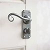 Scrolled Handle, Ilkley Privacy Plate, Polished