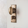 Downley Knob, Ripley Privacy Backplate, Antiqued Brass