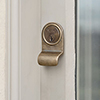 Yale Lock Surround in Antiqued Brass
