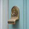 Yale Lock Surround in Antiqued Brass