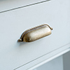 Larder Drawer Pull in Antiqued Brass