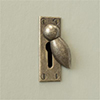 Heritage Escutcheon Plate in Antiqued Brass