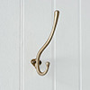 Chandler Coat Hook in Antiqued Brass