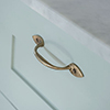 Gilby Drawer Pull in Antiqued Brass