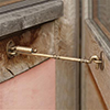 Newport Sprung Cabin Hook in Antiqued Brass