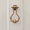 Melton Door Knocker in Antiqued Brass