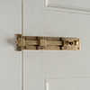 Priory Door Bolt in Antiqued Brass