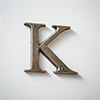 Letter K in Antiqued Brass